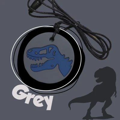 JELLYSTONE DESIGNS Jellystone Gryzak terapeutyczny antystresowy naszyjnik – dinozaur szary | Pan Piksel