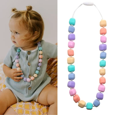JELLYSTONE DESIGNS Jellystone Sensoryczny naszyjnik gryzak Korale księżniczki Princess pastel 3+ | Pan Piksel