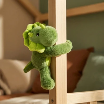 DOUDOU ET COMPAGNIE DOUDOU pluszowa bransoletka slap dinozaur Podcoll Histoire d'Ours ciemny zielony