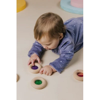 Petit Boum Drewniana zabawka sensoryczna do rączki Donut Calm Zielony 6m+