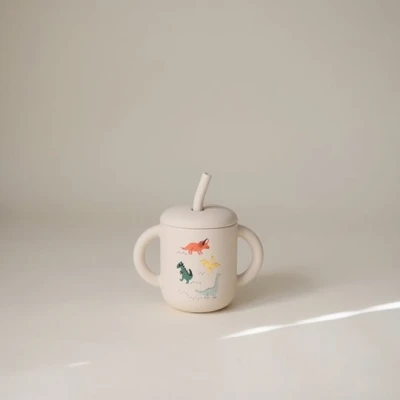 Mushie Silikonowy zestaw obiadowy dla niemowlaka Dino