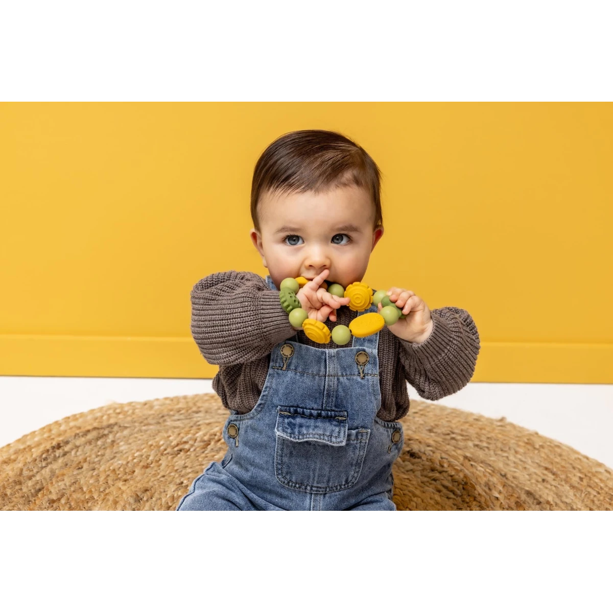 TRIXIE Silikonowa bransoletka gryzak Dinozaur i Lew Baby